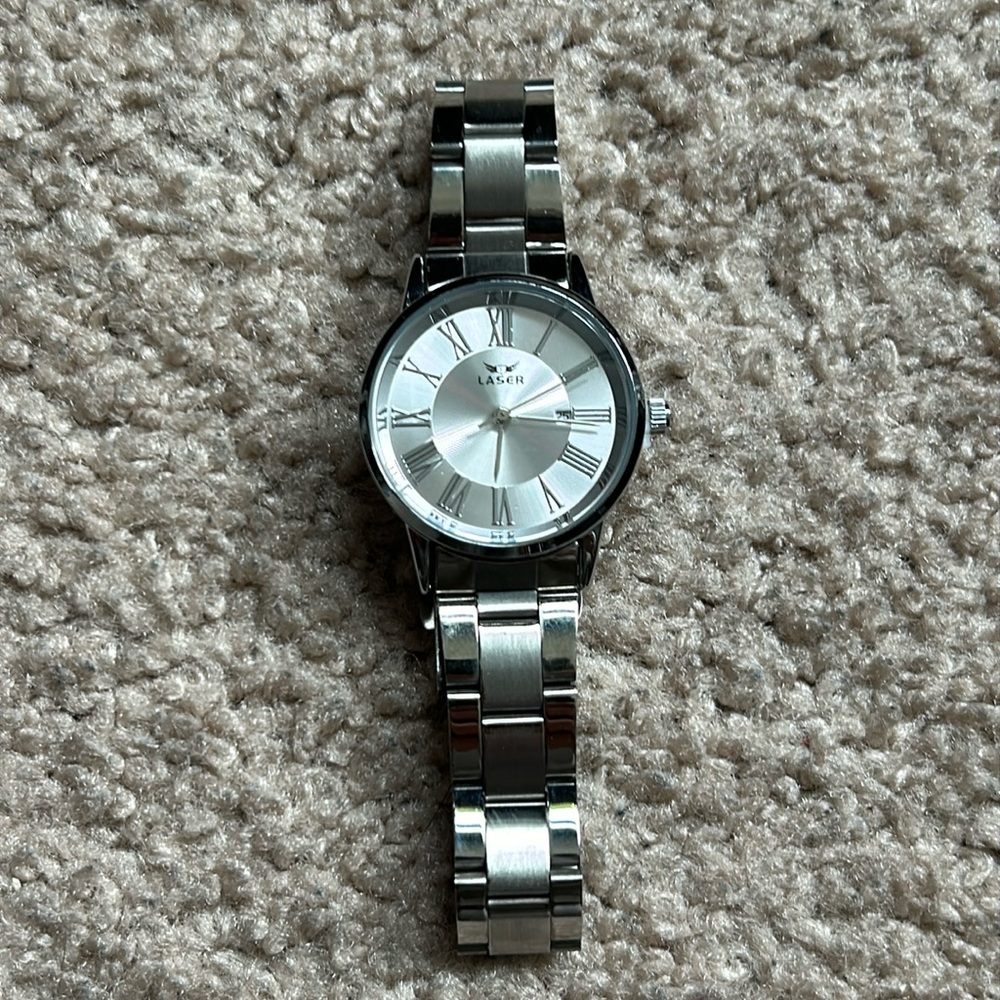 Laser men’s NWOT never worn stainless steel watch fits a M-L sized wrist‎